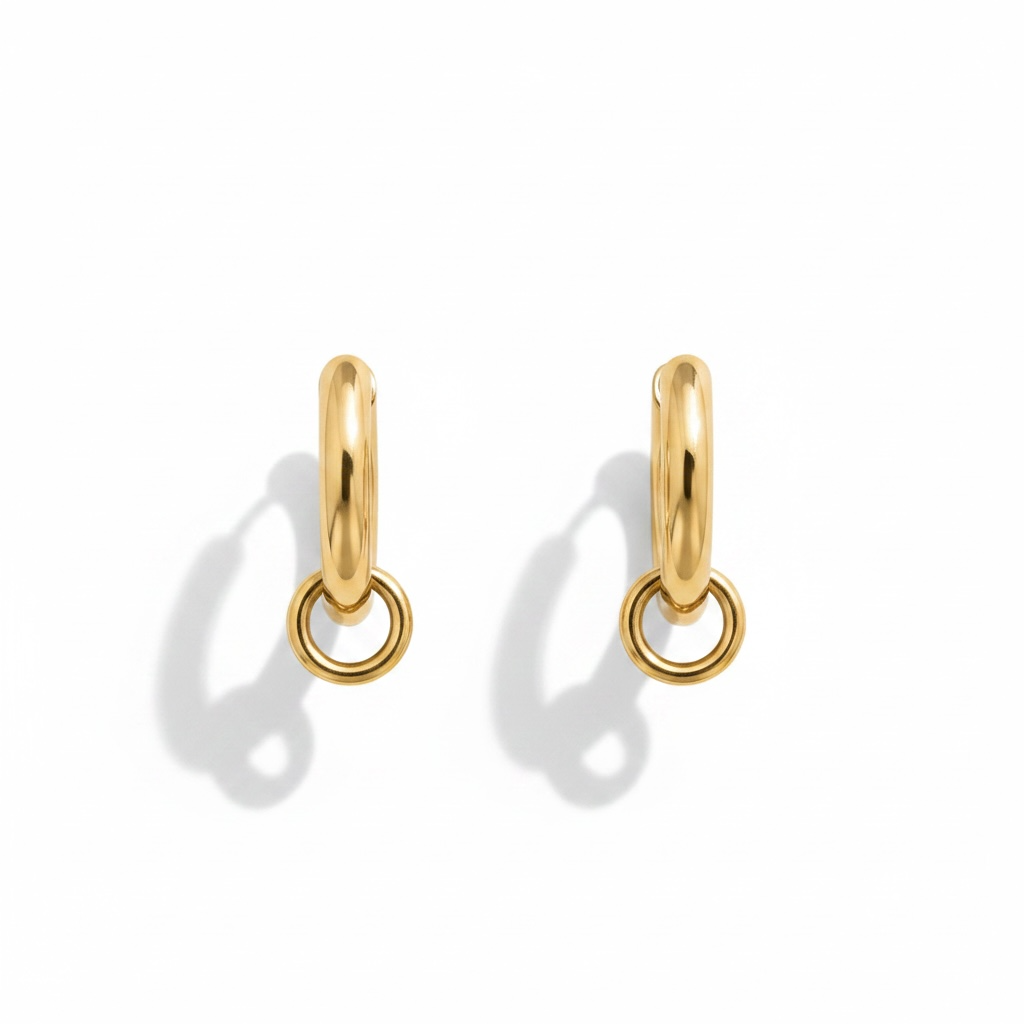 Romy chunky gold huggie hoop earrings with ring detail