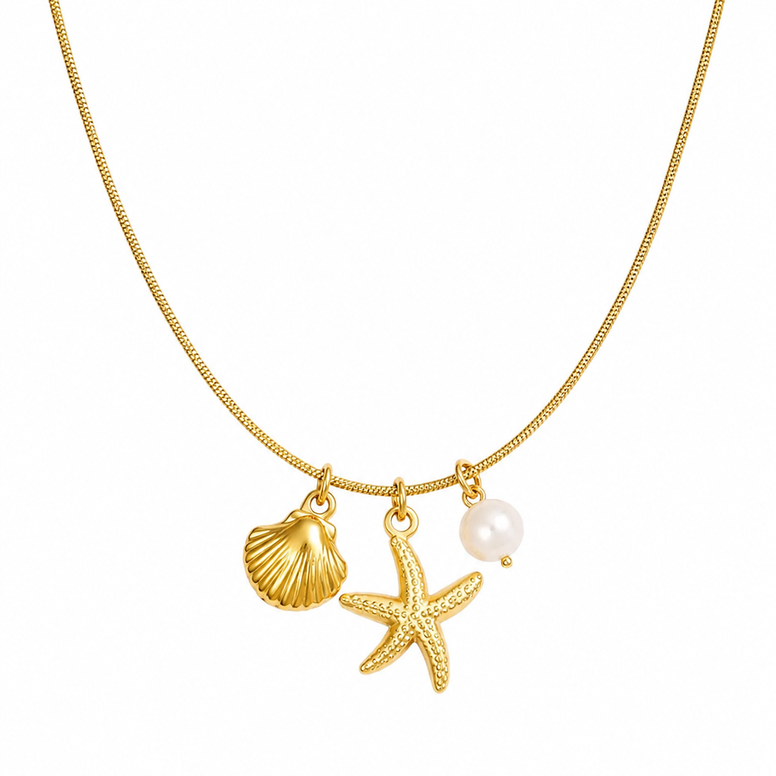 Coastal Charm gold necklace with starfish, seashell and pearl charms