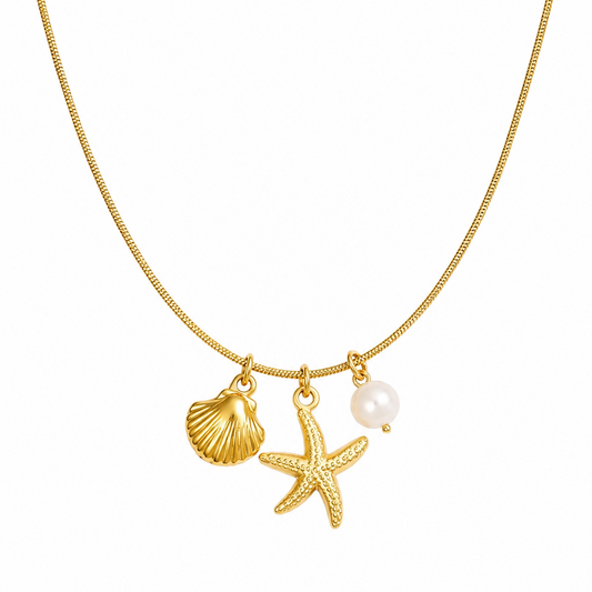 Coastal Charm gold necklace with starfish, seashell and pearl charms