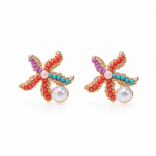Coral Crush colourful gold starfish stud earrings with pearl detail