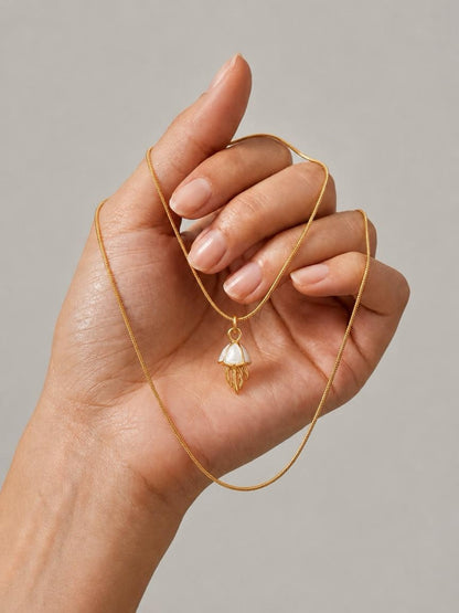 Jelly Babe gold jellyfish charm necklace with white shell detail