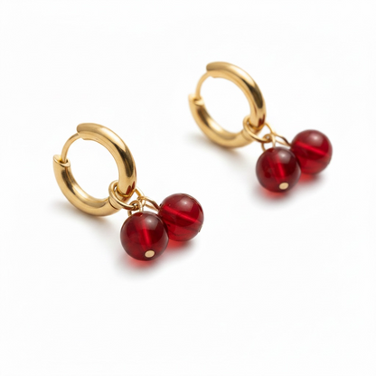 Red beaded cherry charm earrings with gold huggie hoops
